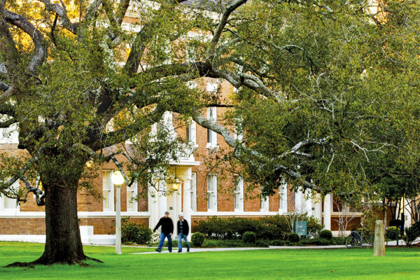 Students walking on campus at Tulane University