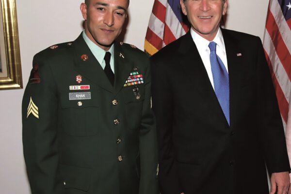 Wounded Army veteran Sergeant Wasim Khan and President George W. Bush